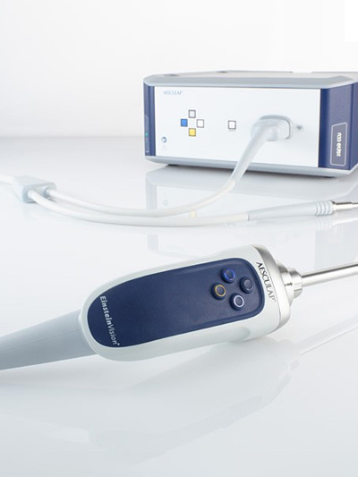 O produto EinsteinVision. Os controles são mostrados na parte frontal, o dispositivo é mostrado mais atrás.